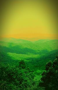 Scenic view of field against sky during sunset