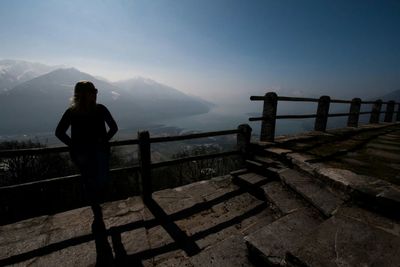 Rear view of man standing on observation point