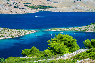 High angle view of sea and mountains