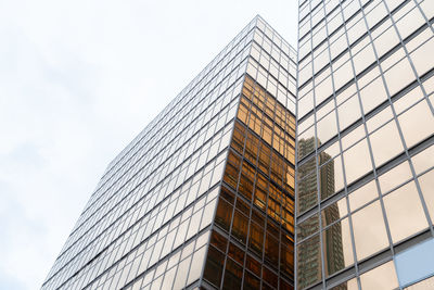 Low angle view of modern building against sky