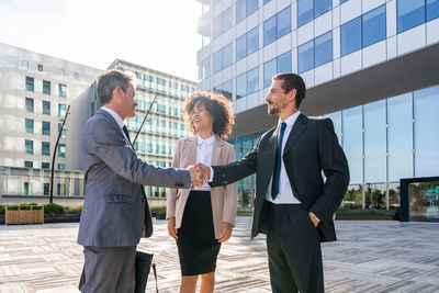 Business colleagues discussing in office