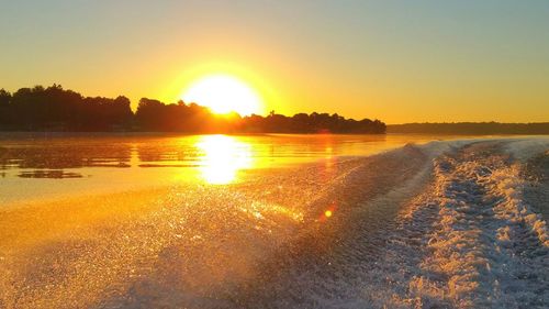Scenic view of sunset over river