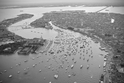 High angle view of cityscape by sea