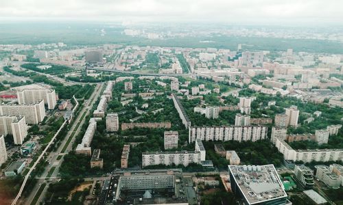 Aerial view of cityscape against sky