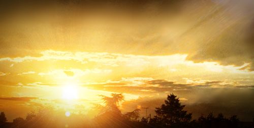 Sun shining through clouds