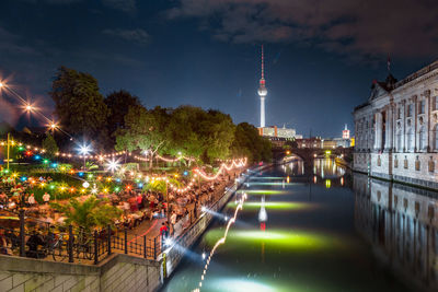 Illuminated buildings in city at night