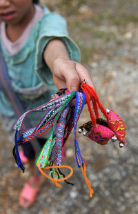 Close-up of girl selling jewelry