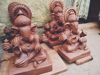 High angle view of buddha statue at temple