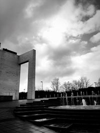 Built structure against cloudy sky