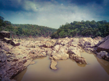 Scenic view of rocky landscape against sky