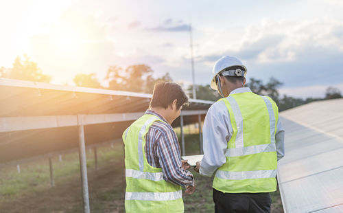 Engineers inspect and maintain solar power plants.  green energy innovation for life