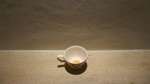 High angle view of coffee cup on table