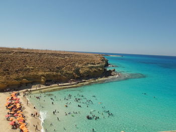 Scenic view of sea against clear blue sky