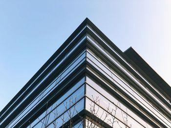 Low angle view of modern building against clear sky