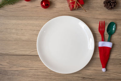 High angle view of eggs in plate on table