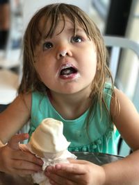 Cute girl eating ice cream