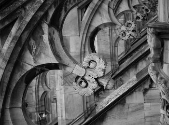 Low angle view of sculpture on building wall