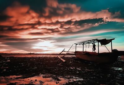 Scenic view of sea against dramatic sky