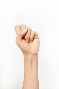 Close-up of human hand against white background