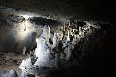 Low angle view of sculpture in cave