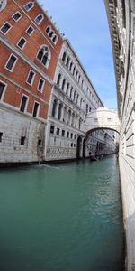 View of canal along buildings