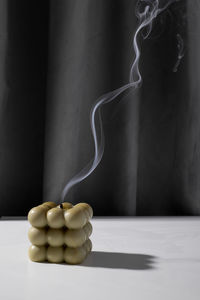 Close-up of candle on table