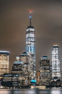 Illuminated buildings in city at night