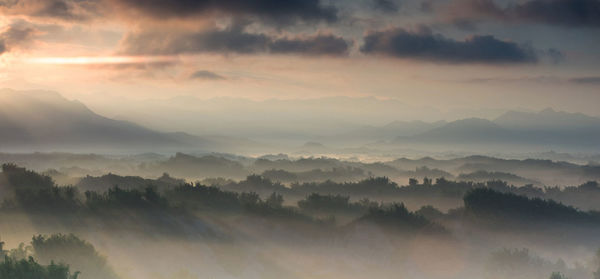 Panoramic view of mountains against sky during sunset