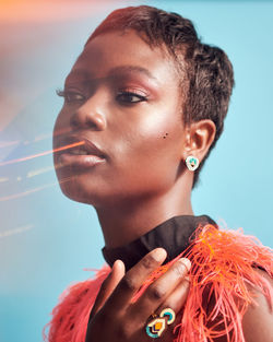 Close-up portrait of young woman looking away