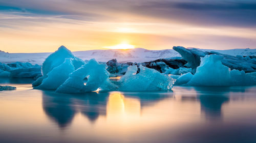 Scenic view of sunset over sea