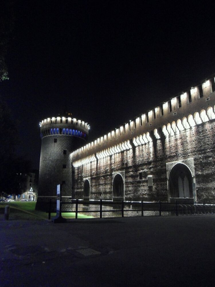 architecture, built structure, night, illuminated, building exterior, arch, architectural column, history, clear sky, column, building, lighting equipment, copy space, dark, outdoors, no people, low angle view, city, street, facade