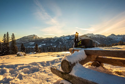 Scenic view of snow covered mountains against sky