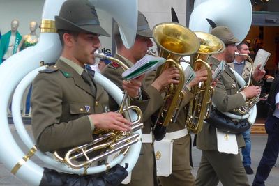 Panoramic view of men playing in music concert