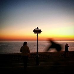 Scenic view of sea at sunset