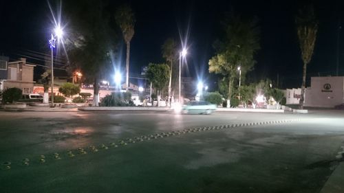 Illuminated street light at night