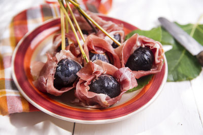 Close-up of figs with ham