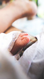 Baby foot under blanket