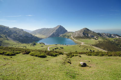 Scenic view of landscape and mountains against sky