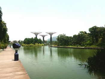 Scenic view of calm lake against clear sky