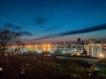 High angle view of illuminated city buildings at night