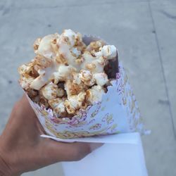 Midsection of person holding ice cream