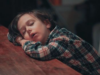 Portrait of boy sleeping at home