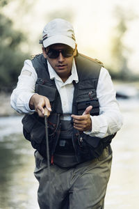 Man fishing in river