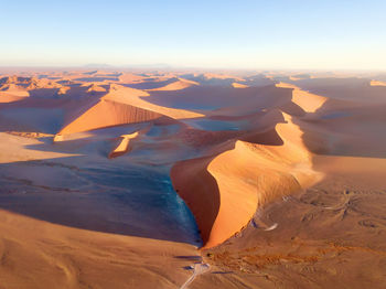 Aerial view of desert against sky