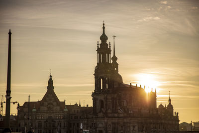 Traditional building against sky during sunset in city