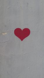 Close-up of heart shape on wall