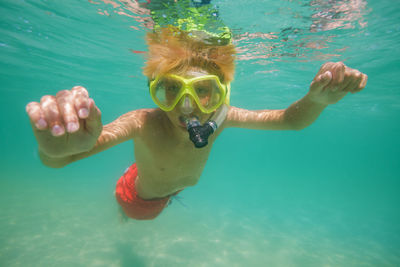 Man swimming in sea