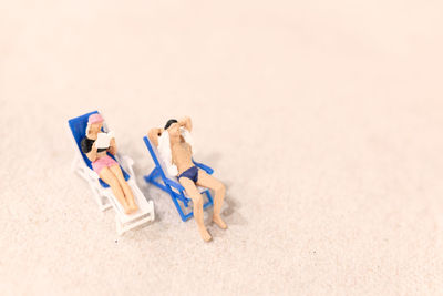 High angle view of stuffed toy on sand