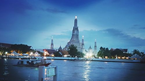 View of illuminated temple against sky at night