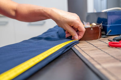 Close-up of person working on table